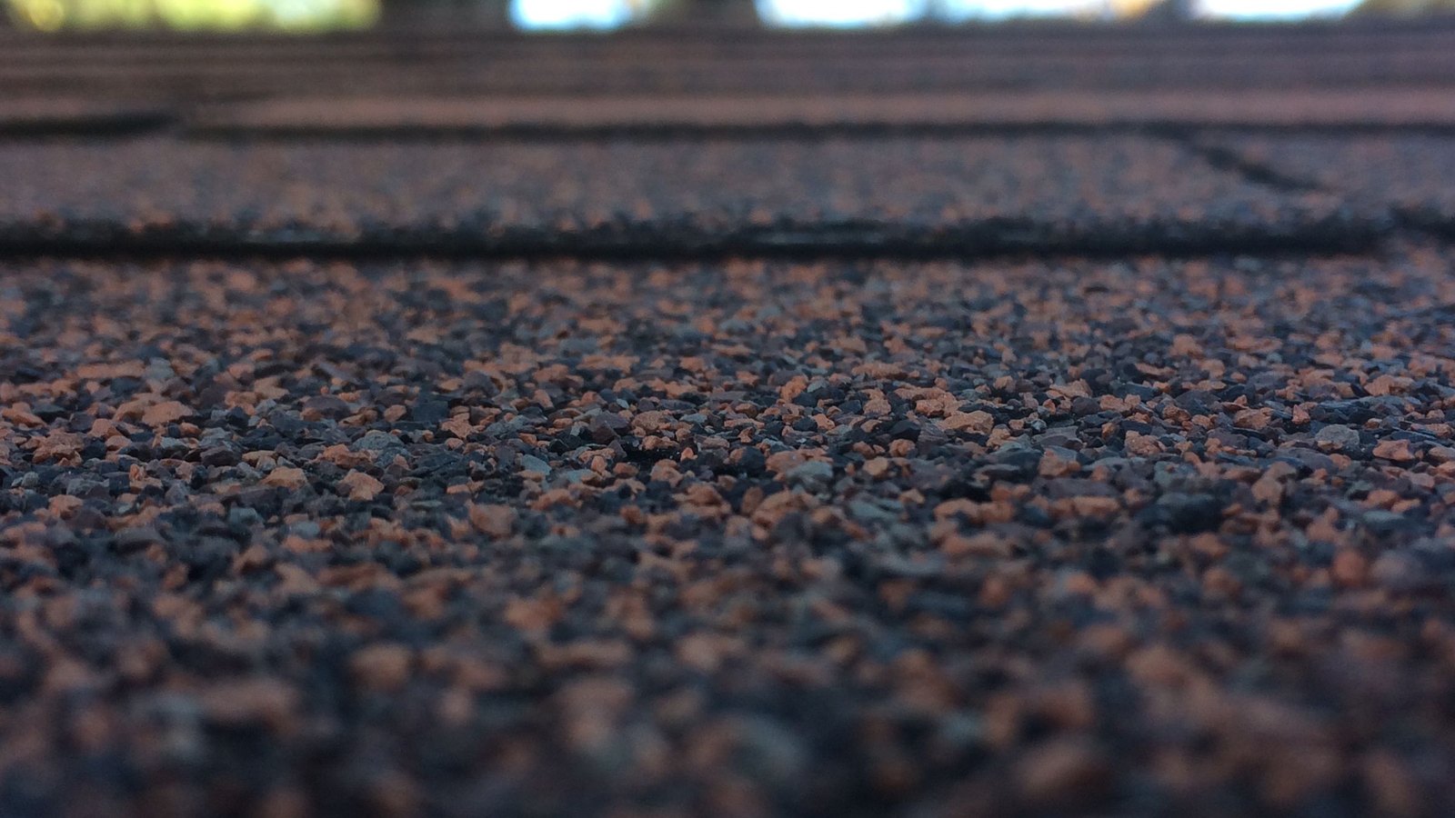 Close view of overlapping asphalt shingles